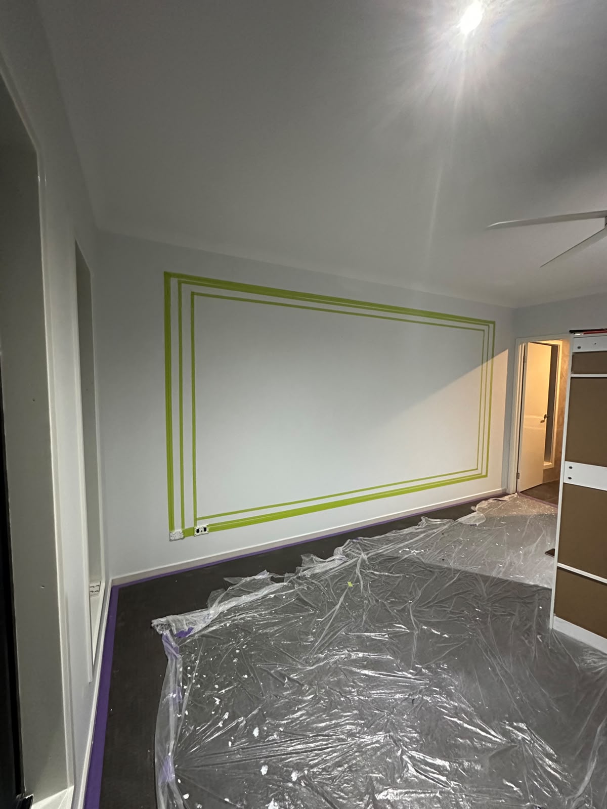 Precision line masking for two-tone cinema room feature wall
