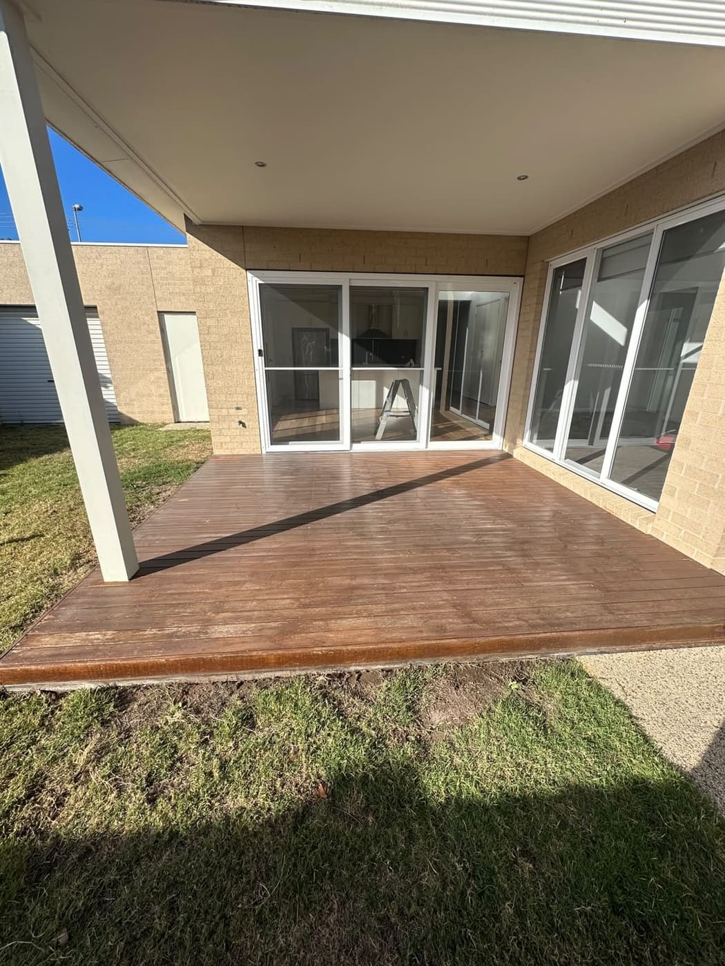 Outdoor entertaining timber deck cleaned and prepped for dark stain