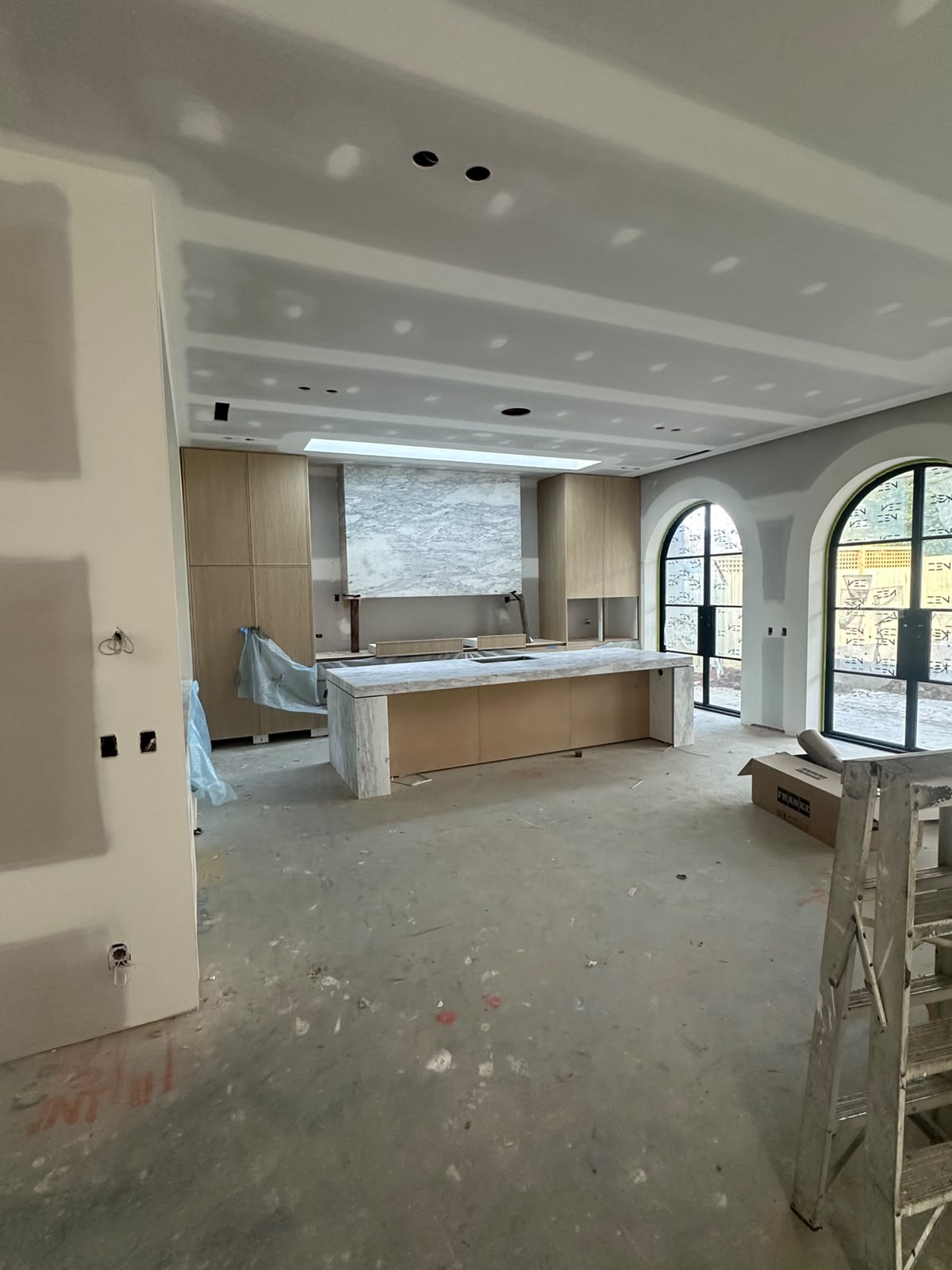 Architectural new build interior prep with full window protection